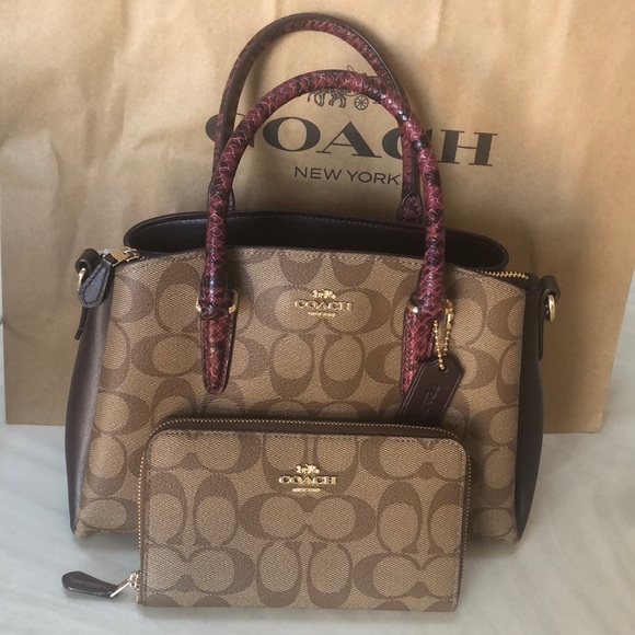 Coach Handbags - Coach hand Bag and a walled